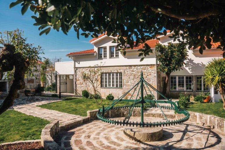 Courtyard with the old iron wheel