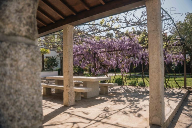 Stone table under the pergola